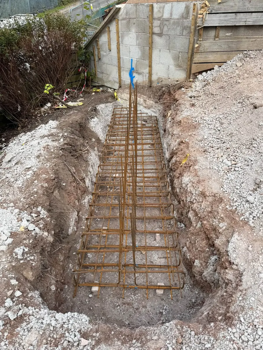 Excavated footing trench with steel reinforcement laid, GRW Homes groundworks on a school project
