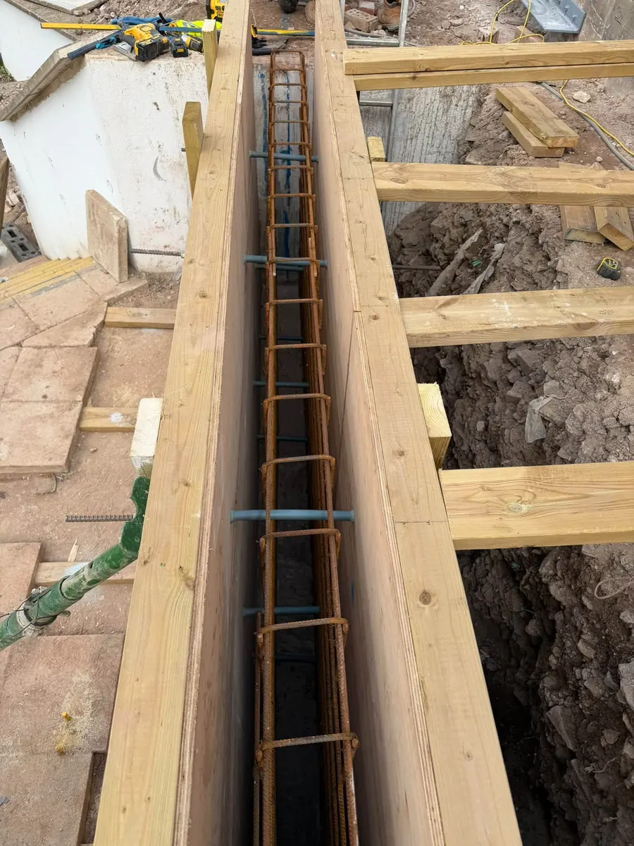 Long run of timber formwork and steel reinforcement, GRW Homes groundworks on a school project