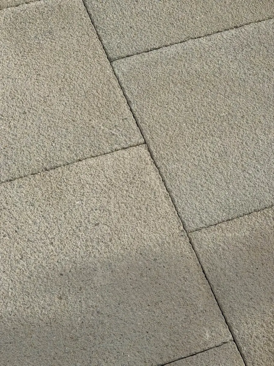 Close-up of newly laid paving slabs, GRW Homes groundworks on a school project